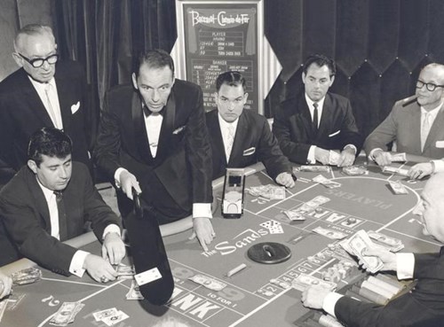 B&W photo of players Baccarat on the table